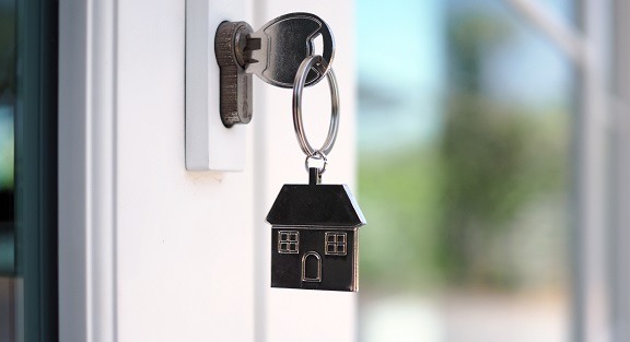 The,house,key,for,unlocking,a,new,house,is,plugged